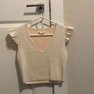 Club Monaco cropped pink sweater top with ruffle sleeves. Size xs.